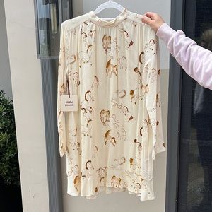 Little Moon baby doll green colored dress with horse-print motifs